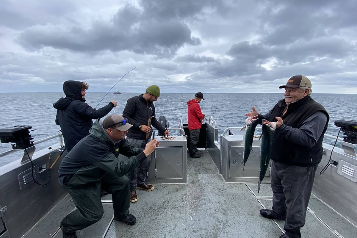 on deck with fish
