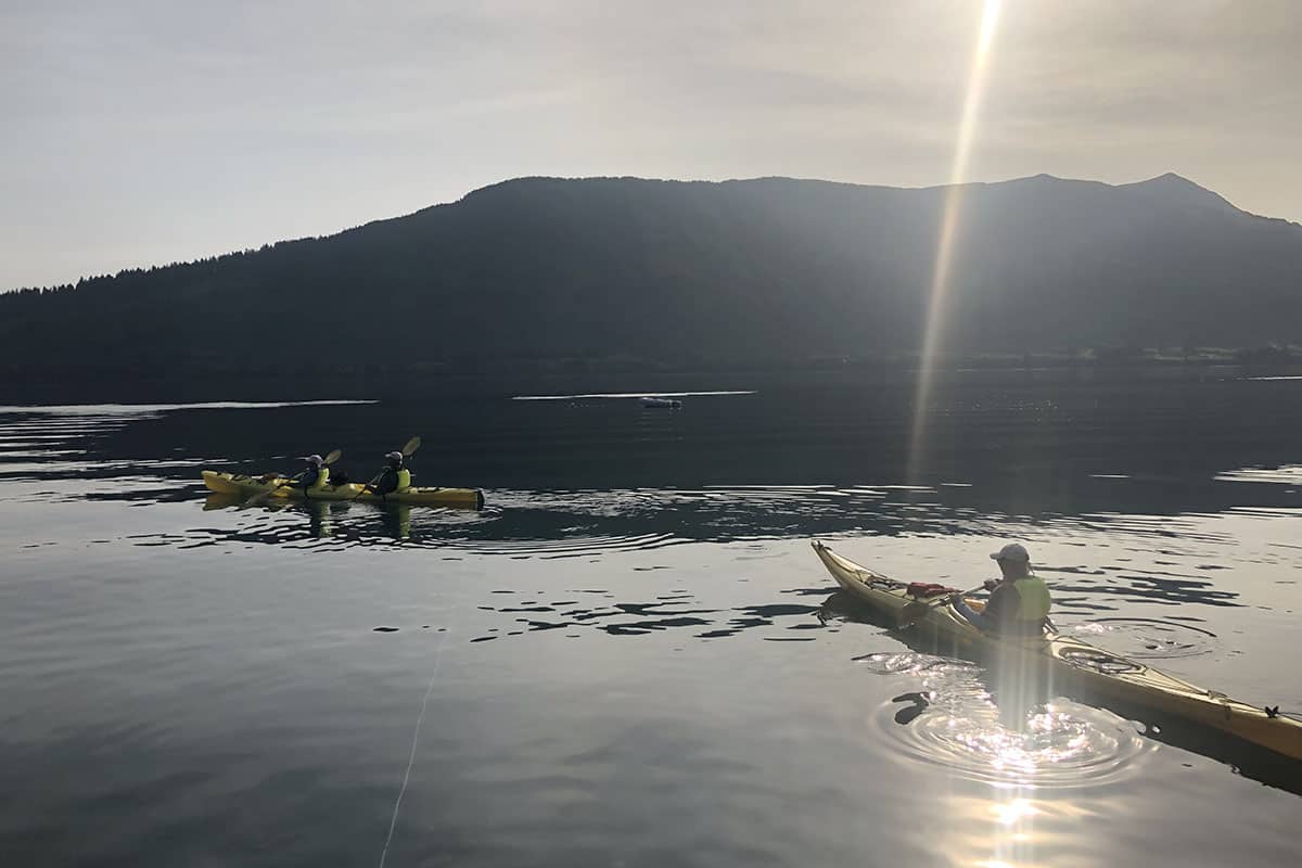 shaft oflight strikes the water by the keyakers